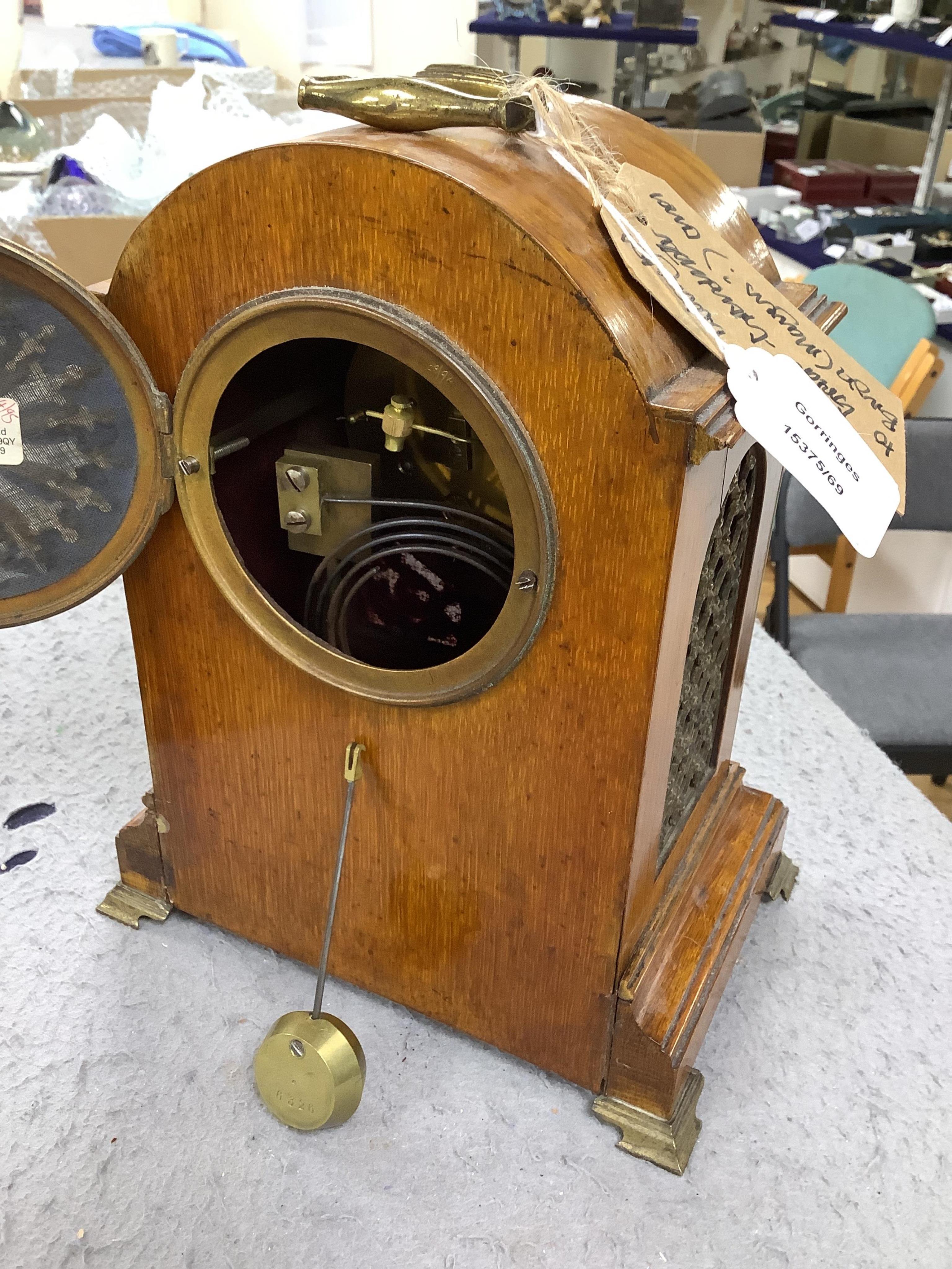 A 19th century mahogany eight day mantel clock with enamel dial and pendulum, 30cm high. Condition - fair, not tested